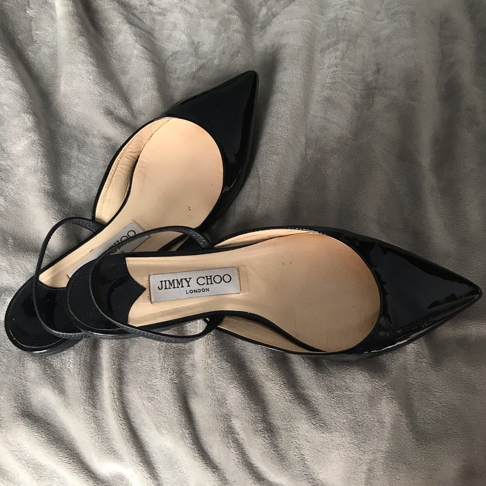 Jimmy Choo Black patten leather flats.